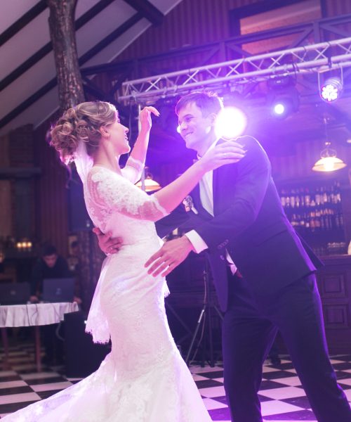 beautiful bride and groom dancing the first dance